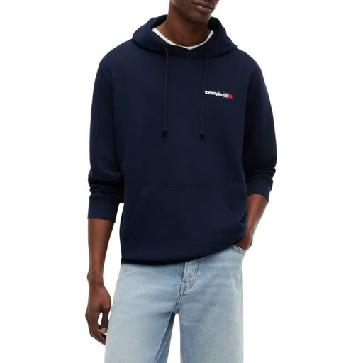 Navy blue Tommy Hilfiger Jeans men sweatshirt with white and red logo made from organic cotton