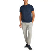 Navy blue tommy hilfiger jeans men round neck cotton t shirt with short sleeves chest pocket and subtle logo detail