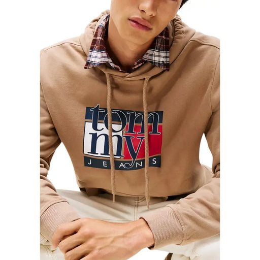 Men’s tan hoodie with plaid collar and Tommy Jeans logo from Tommy Hilfiger