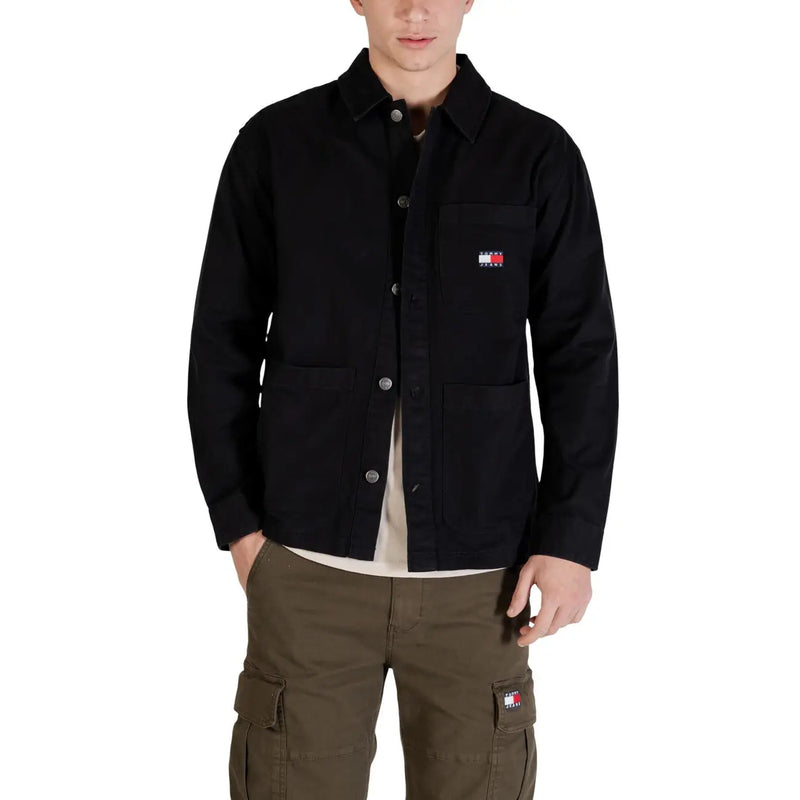 Black Tommy Hilfiger work jacket with button closures and chest logo patch in Tommy Hilfiger Jeans men shirt collection