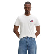 Weißes, schmal geschnittenes Tommy Hilfiger Baumwoll-T-Shirt mit kleinem, buntem Flaggenemblem auf der linken Brust für Herren, beige, Größe S