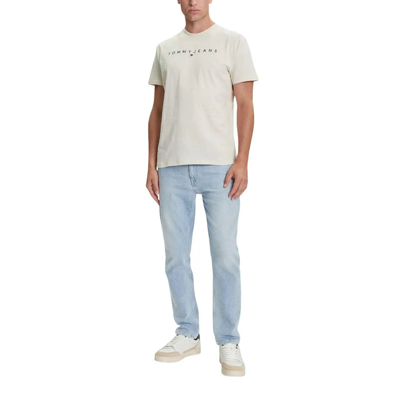 Beige tommy hilfiger jeans men t-shirt with black logo print across the chest made from comfortable fabric