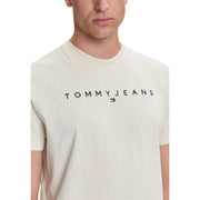 Cream-colored Tommy Hilfiger Jeans men t-shirt with black Tommy Jeans lettering and a small flag logo beneath it