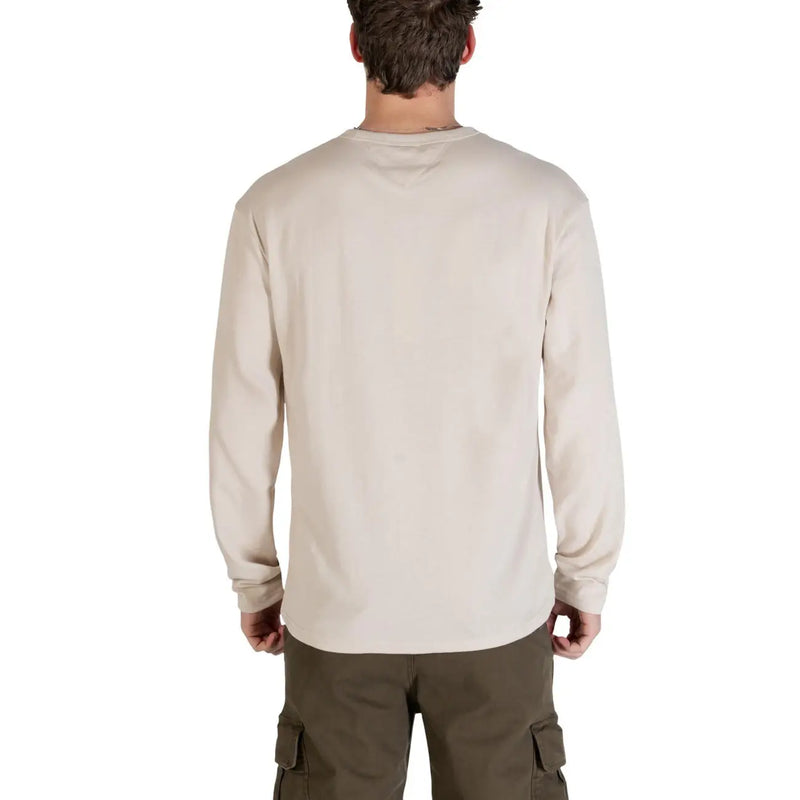 Tommy Hilfiger Jeans men t shirt beige organic cotton long sleeve crewneck with soft textured fabric and subtle shoulder fading