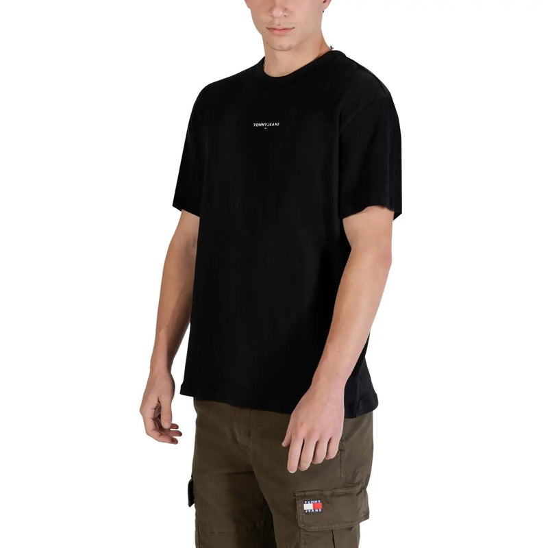 Black Tommy Hilfiger Jeans men t-shirt with subtle white logo on chest, featuring comfortable cotton material
