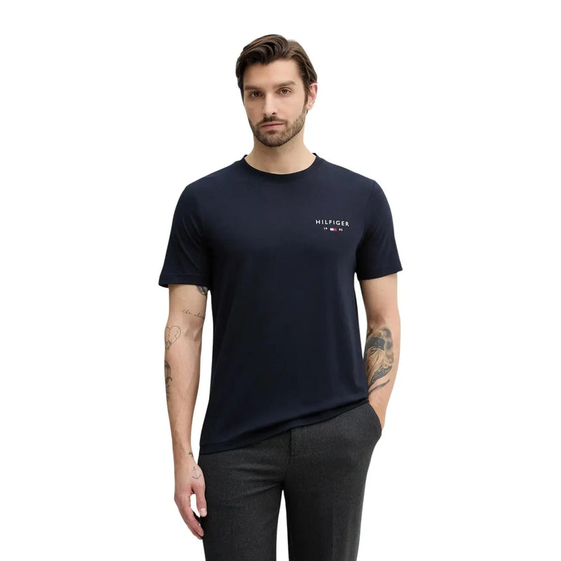 Navy blue Tommy Hilfiger short-sleeved cotton t-shirt with small white logo on left chest for men in size small
