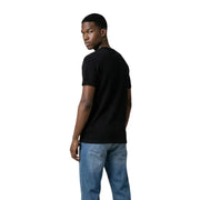 T-shirt noir à manches courtes et col rond en coton t-shirt pour hommes par Tommy Hilfiger Jeans idéal pour les tenues décontractées