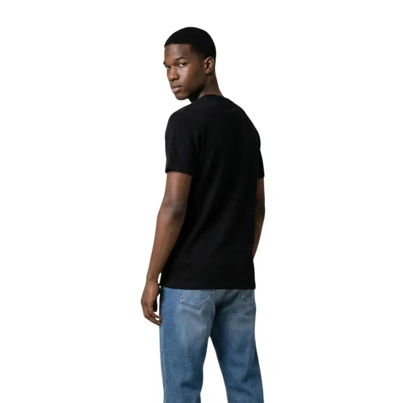 T-shirt noir à manches courtes et col rond en coton t-shirt pour hommes par Tommy Hilfiger Jeans idéal pour les tenues décontractées