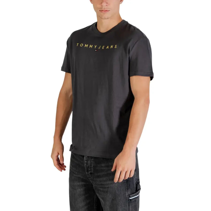 Schwarz Tommy Hilfiger Jeans Männer t-shirt mit goldener Schrift aus Baumwollstoff auf der Brust