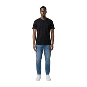 T-shirt noir à manches courtes et col rond en coton t-shirt avec un petit logo brodé sur la poitrine gauche par Tommy Hilfiger Jeans hommes