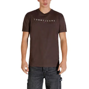 Brown Tommy Hilfiger Jeans men t-shirt with white logo and red white and blue flag emblem on the chest
