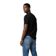 T-shirt noir à manches courtes et col rond en coton t-shirt pour hommes par Tommy Hilfiger Jeans avec une coupe classique