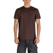 Tommy Hilfiger Jeans Männer t-shirt aus braunem Baumwollstoff mit einem dezenten weißen Logo auf der Brust