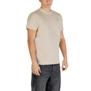 Jeans beiges Tommy Hilfiger pour hommes t-shirt avec un col rond et un logo brodé discret sur la poitrine