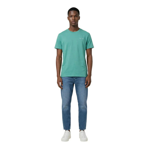 Tommy Hilfiger Jeans men t-shirt in teal cotton with short sleeves and a subtle embroidered logo on the left chest