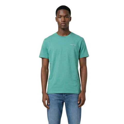 Teal tommy hilfiger jeans men t-shirt with crew neck and subtle white logo on the left chest for casual wear