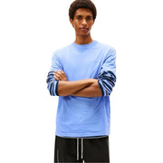 Light blue Tommy Hilfiger Jeans men t shirt with long sleeves, navy and white striped cuffs, made of organic cotton