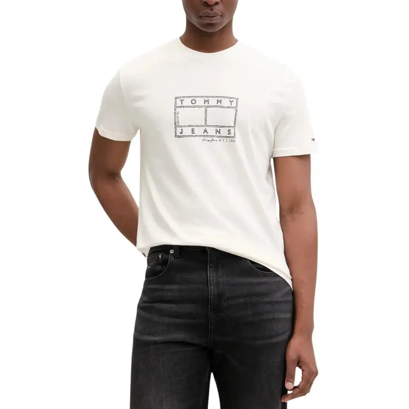 White tommy hilfiger jeans men t shirt made of organic cotton with a black graphic logo on the chest