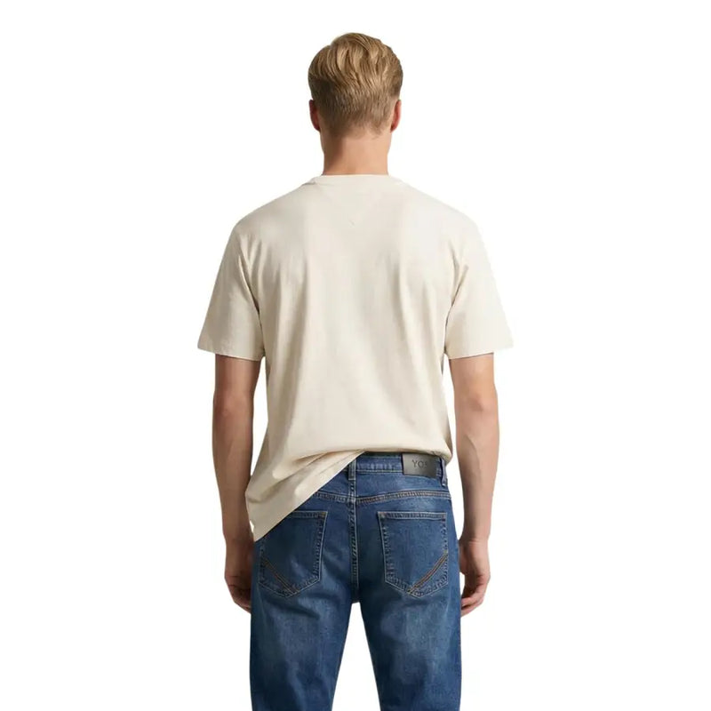 Beige short-sleeved cotton t-shirt with crew neck from Tommy Hilfiger Jeans men collection made of organic cotton