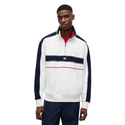 Tommy Hilfiger Jeans Sweat-shirt homme en coton biologique blanc à rayures, manches bleu marine et bande rouge sur la poitrine.