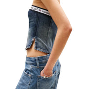 Blue denim tommy girl cropped top with star detail and raw hem made of organic cotton by Tommy Hilfiger Jeans women