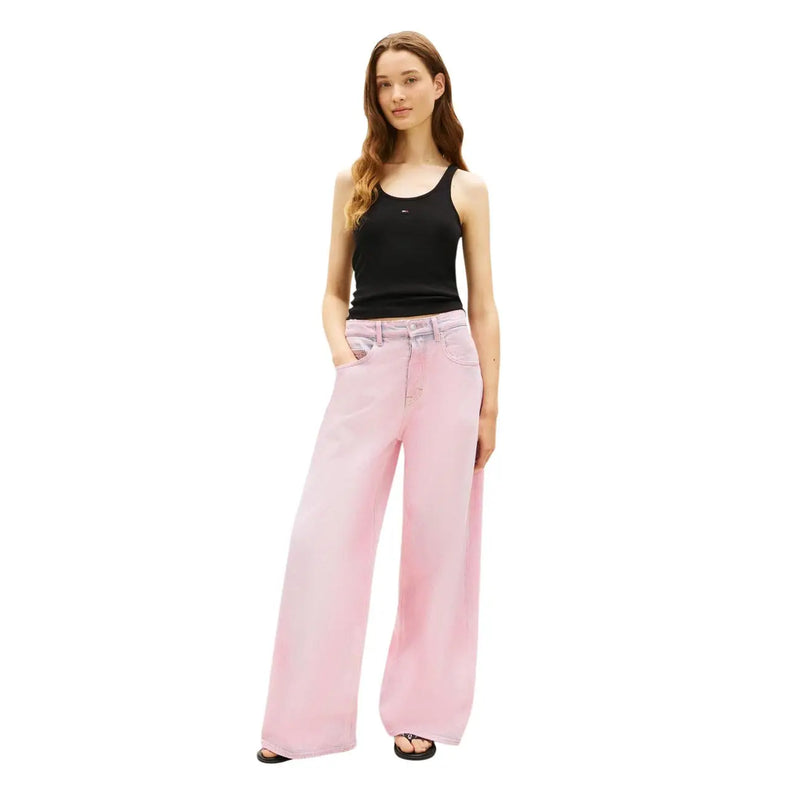 Pink wide-leg denim trousers paired with tommy hilfiger black cotton round neck tank top for women