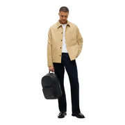Tommy Hilfiger Lederrucksack TH Foundation für Herren in Schwarz mit Vordertasche und top Griff, Vorderansicht