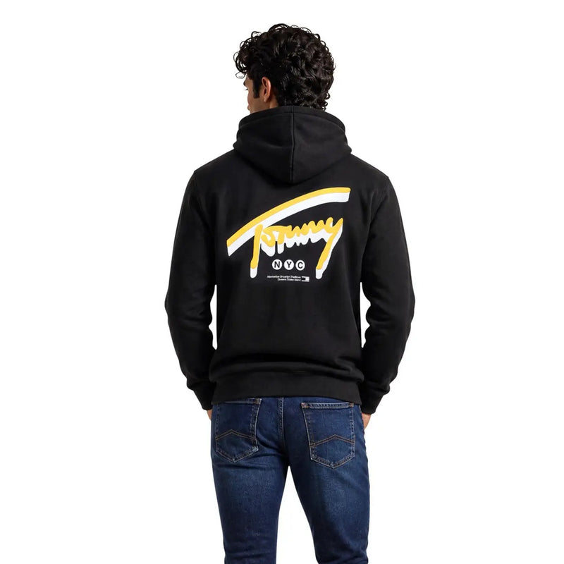 Schwarzer Tommy Hilfiger Herren-Baumwoll-Hoodie mit auffälligem gelb-weißem Logo auf der Rückseite