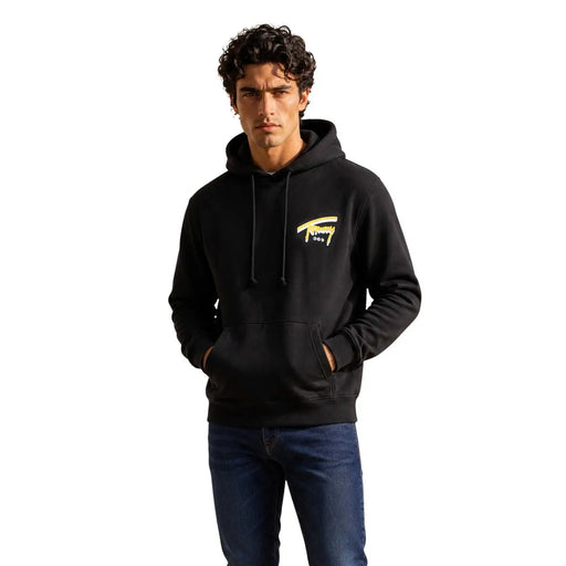 Tommy Hilfiger men black cotton hoodie sweatshirt with a gold logo on the chest front