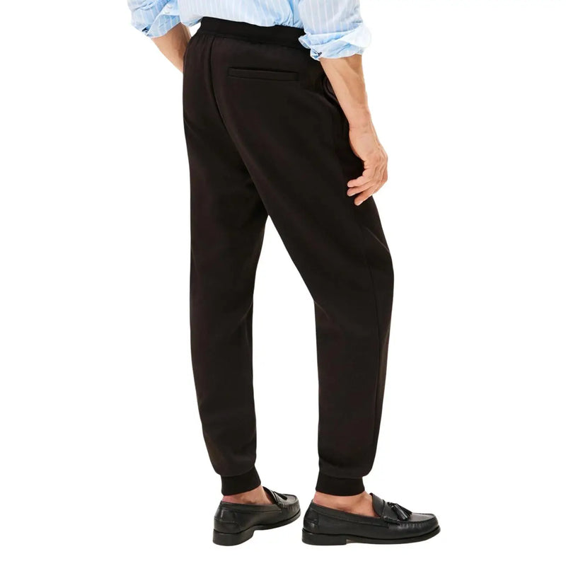 Tommy hilfiger men black cotton jogger trousers with relaxed fit and elastic waistband visible from the back side