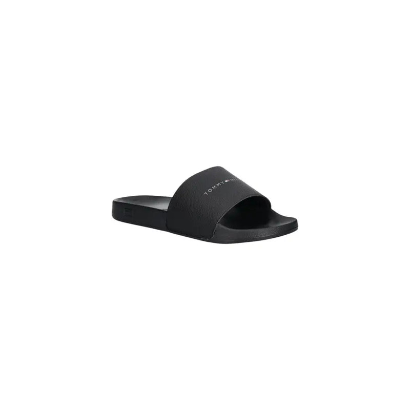 Black tommy hilfiger slide sandal in polyurethane with a minimalist design and subtle logo on the strap size 41