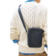 Navy blue leather crossbody bag with Tommy Hilfiger logo plaque and red white blue flag emblem 20cm mini reporter bag