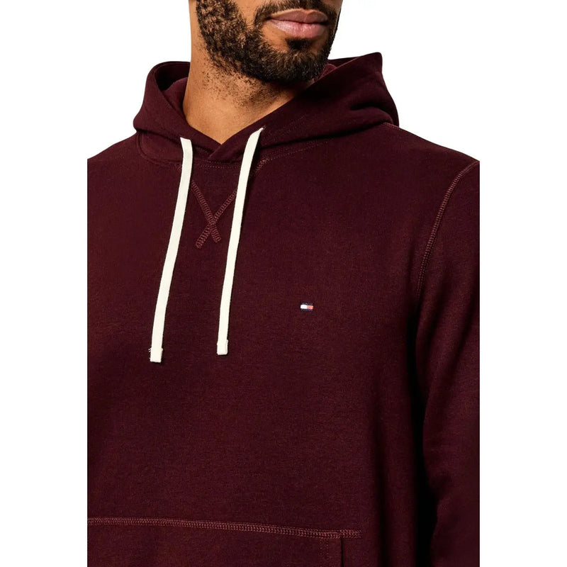Tommy Hilfiger Herren-Hoodie aus bordeauxrotem Baumwollmischgewebe mit weißen Kordelzügen und kleinem Logo auf der Brust für die Freizeit.