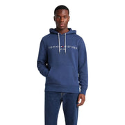 Marineblau Tommy Hilfiger Herren-Baumwollhoodie mit weißen Kordelzügen und Vordertasche für die Freizeit.