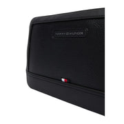 Black textured leather tommy hilfiger clutch with subtle embossed logo and signature flag tab size w27 polyurethane pouch