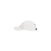 White polyester baseball cap by tommy hilfiger with chevron print and subtle red and black logo on the side