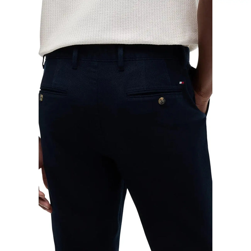 Marineblau Tommy Hilfiger Herren-Baumwollhose im Denton-Schnitt mit goldfarbenen Knöpfen und dezenter Webstruktur
