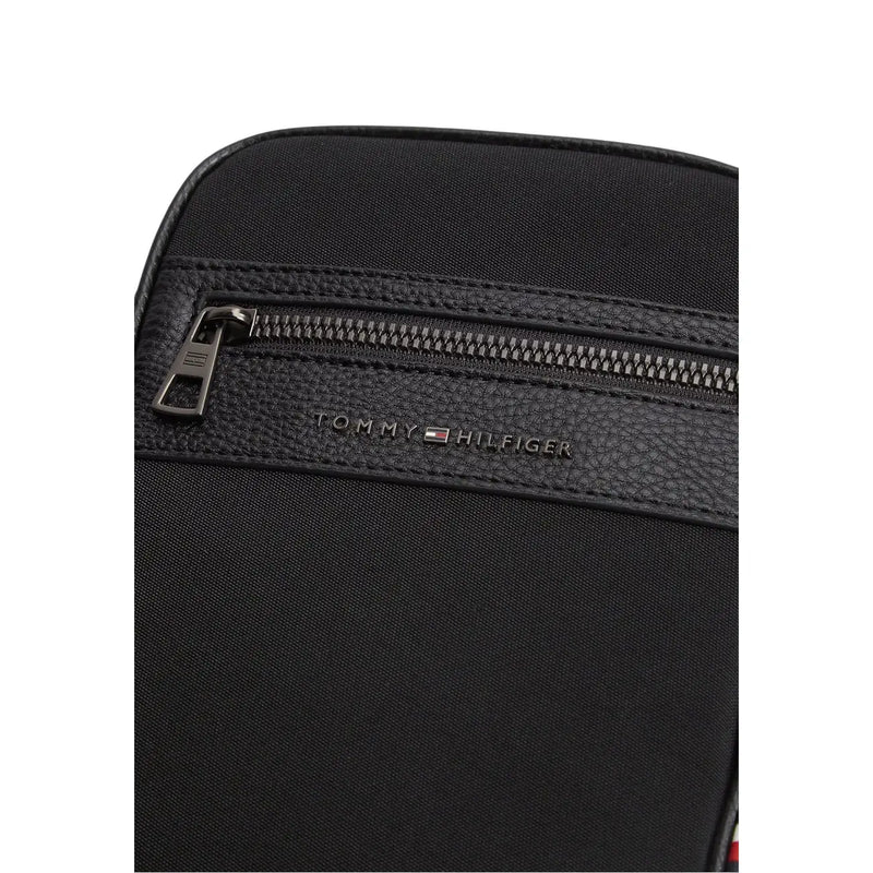 Tommy Hilfiger men faux leather black crossbody mini reporter bag with textured leather trim and zipper detail