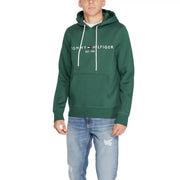 Tommy Hilfiger men green cotton hoodie sweatshirt with white drawstrings and front pocket in dark green color