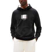 Schwarzer Tommy Hilfiger Herren-Hoodie mit weiß-rot gestreiftem Logo und beigefarbenem Innenfutter aus Bio-Baumwolle