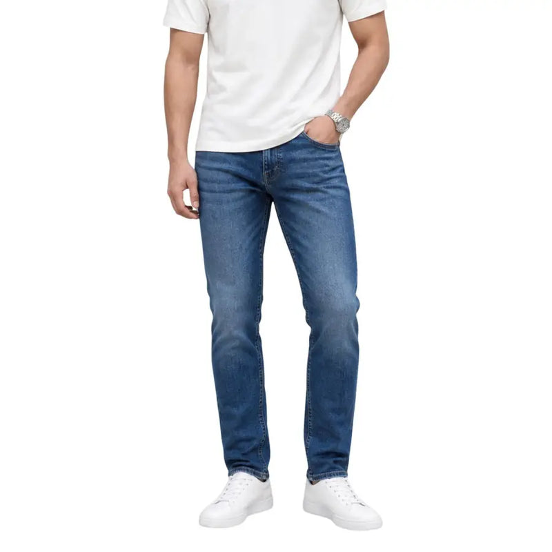 Blue denim slim fit cotton jeans with subtle fading from Tommy Hilfiger men Austin slim tapered collection