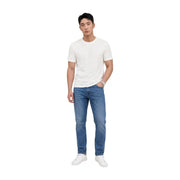A pair of tommy hilfiger men jeans austin slim tapered blue cotton with medium wash and classic five-pocket design