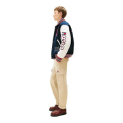 Navy and white varsity jacket with red white and blue striped trim and 85 embroidered on the sleeve for men by tommy hilfiger