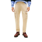 Beige tommy hilfiger jeans men trousers featuring cargo style with multiple pockets and logo patch on the thigh