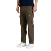Olive green tommy hilfiger men jeans in organic cotton featuring multiple cargo pockets and logo patch on thigh
