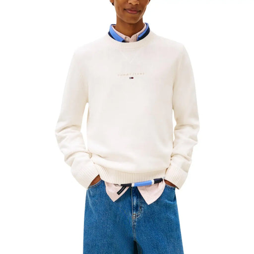 Cream-colored tommy hilfiger men’s knitwear crewneck sweater with organic cotton and subtle gold embroidery on chest