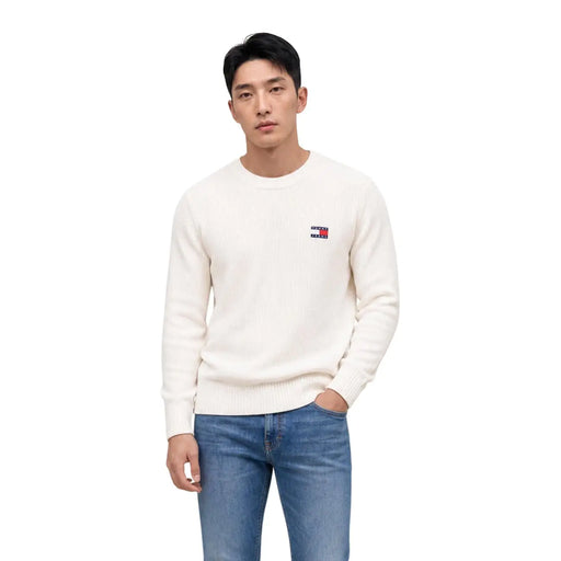 Cream-colored tommy hilfiger men knitwear crewneck sweater with small embroidered flag logo made from organic cotton