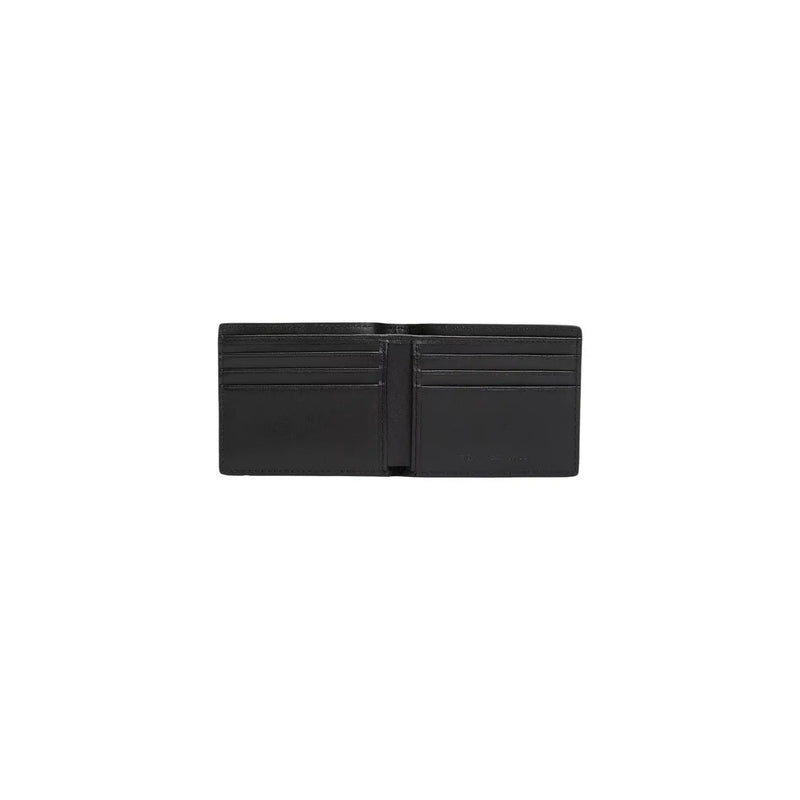 Black leather wallet with multiple card slots and minimalist design from Tommy Hilfiger men wallet collection