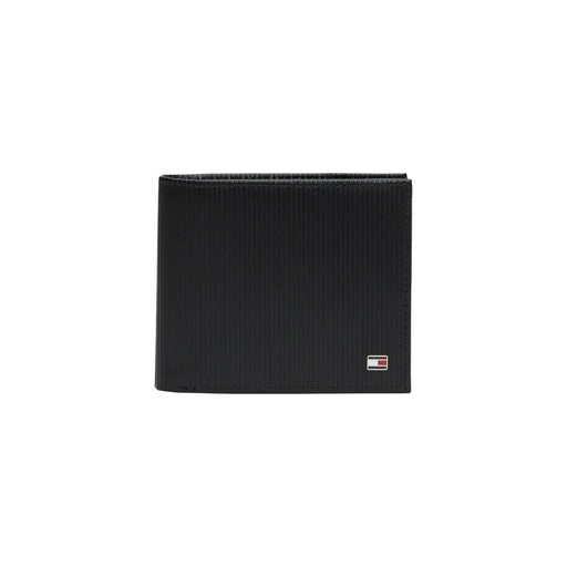 Black textured Tommy Hilfiger men wallet with small logo on the lower right corner in genuine leather