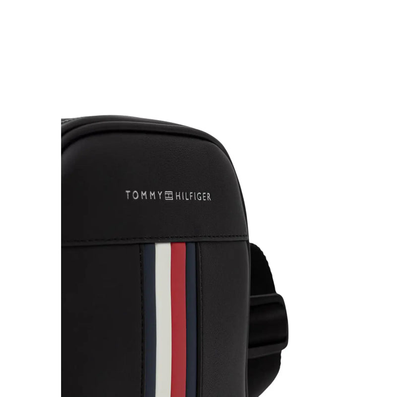Black tommy hilfiger metro mini reporter crossbody bag with red white and navy side stripes in men’s style
